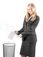 Middle aged woman casting a letter in the waste paper bin
