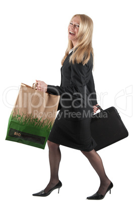 Middle aged Business woman with briefcase and carrier bag