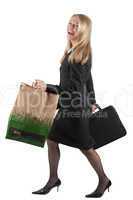 Middle aged Business woman with briefcase and carrier bag