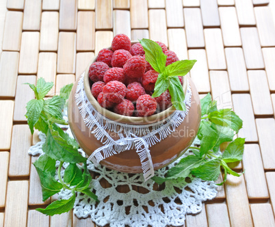 Raspberries in a jar