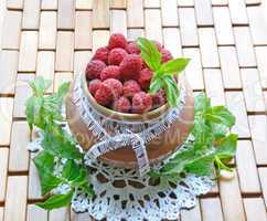 Raspberries in a jar