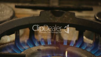 HD1080p25 Blue flame on a burner of a gas stove.