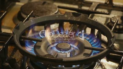 HD1080p25 Blue flame on a burner of a gas stove.