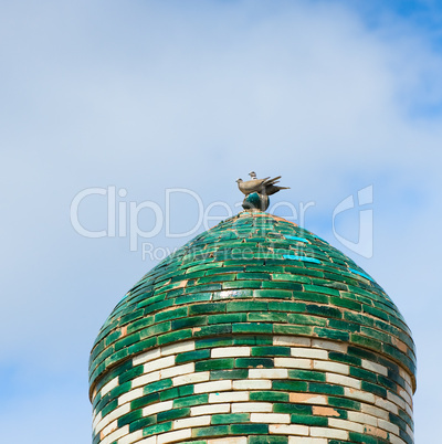Two doves on the top of minaret