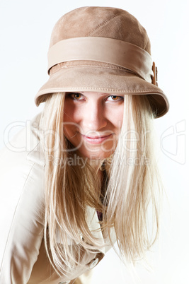 Portrait of a girl in a leather hat