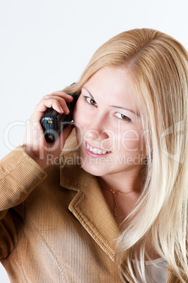 Woman talking by the phone