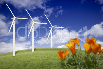 Wind Turbines Against Dramatic Sky and California Poppies  .