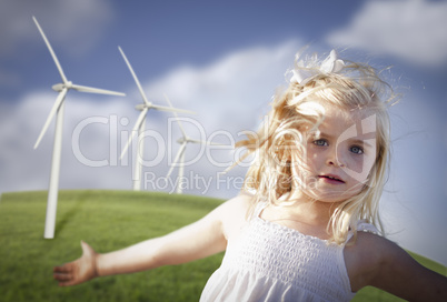 Beautiful Young Girl and Wind Turbine Field