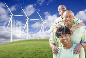 Happy African American Family and Wind Turbine