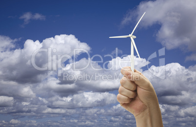 Male Fist Holding Wind Turbine Outside