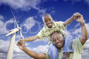Happy African American Father and Son with Wind Turbine