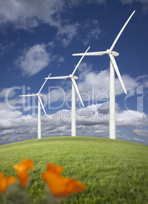 Wind Turbines Against Dramatic Sky and California Poppies  .