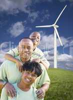 Happy African American Family and Wind Turbine