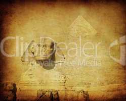 grunge image of sphynx and pyramid