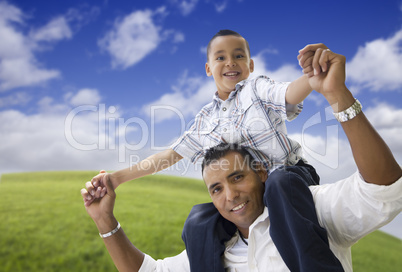 Hispanic Father and Son Having Fun Together