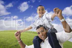 Hispanic Father and Son Having Fun Together