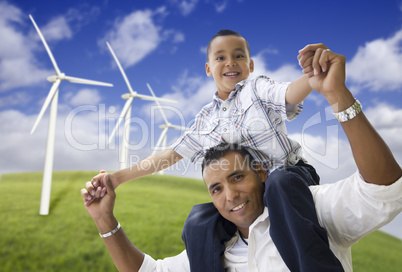 Happy Hispanic Father and Son with Wind Turbine