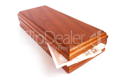 Wooden box with money