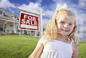 Cute Smiling Girl in Yard with For Sale Real Estate Sign and Hou