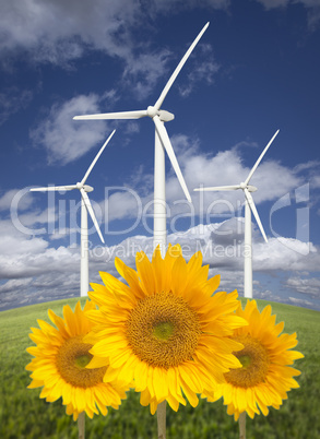 Wind Turbines Against Dramatic Sky with Bright Sunflowers