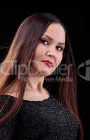 woman with long hair in dark cloth