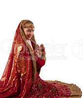 Young girl smile in oriental red indian costume