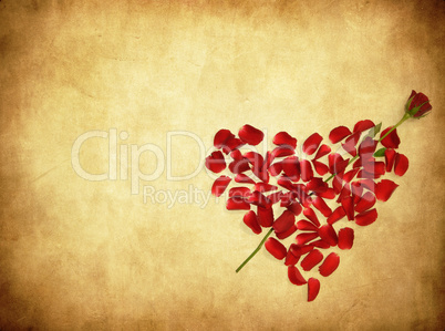 grunge background with heart made od rose petals