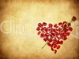 grunge background with heart made od rose petals