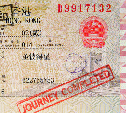 passport with hong kong visa and stamps