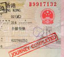 passport with hong kong visa and stamps