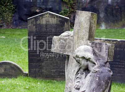 Cross in ancient graveyard