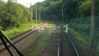 Passenger train goes to Carpathians (view from the machinist cab)