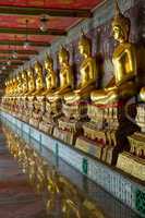 golden buddhas in wat sutat, bangkok