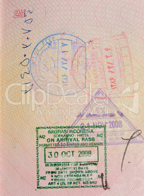 passport with iranian and indonesian stamps