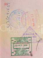 passport with iranian and indonesian stamps