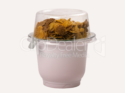 yogurt with corn flakes in a plastic container