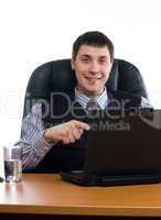 Portrait of a young businessman with laptop