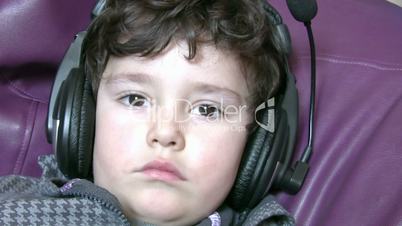 Little boy with earphones