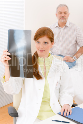 Doctor office - female physician patient x-ray