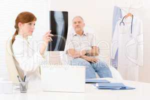 Doctor office - female physician patient x-ray