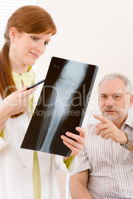 Doctor office - female physician patient x-ray