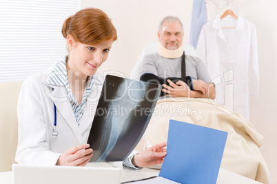 Doctor office - female physician x-ray patient