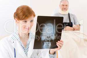 Doctor office - female physician x-ray patient