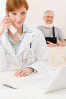 Doctor office - female physician use phone