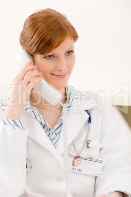 Doctor office - female physician make phone call