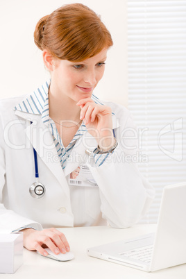 Doctor office - female physician work computer