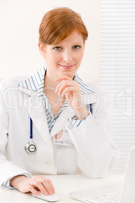 Doctor office - female physician work computer