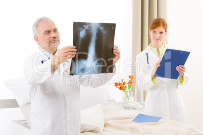 Medical team - portrait doctor x-ray in hospital