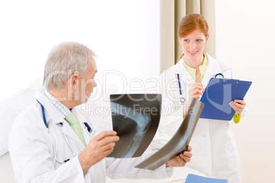 Medical team - portrait doctor x-ray in hospital