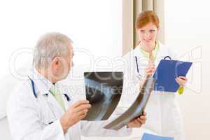 Medical team - portrait doctor x-ray in hospital
